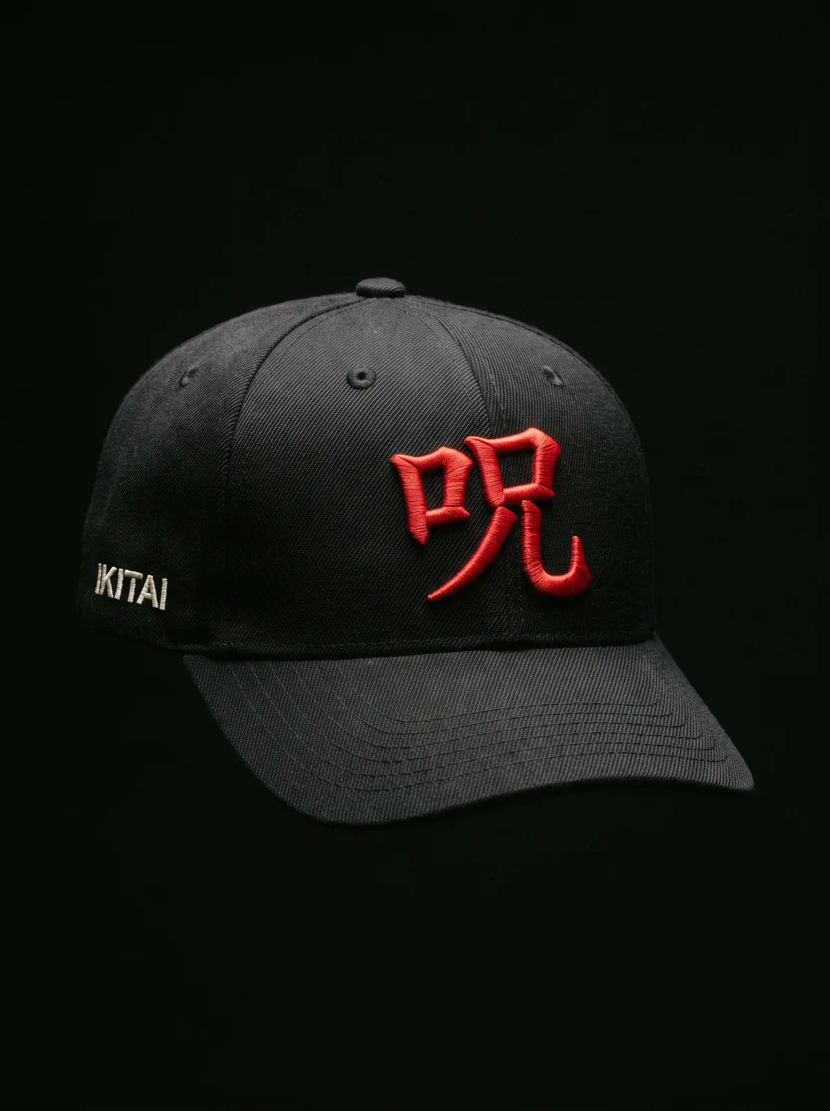 IKITAI Noroi Structured Cap, black six-panel brushed cotton twill with an embroidered Japanese curse kanji on the front panel